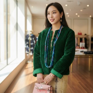 Green silk-lined velvet quilted coat